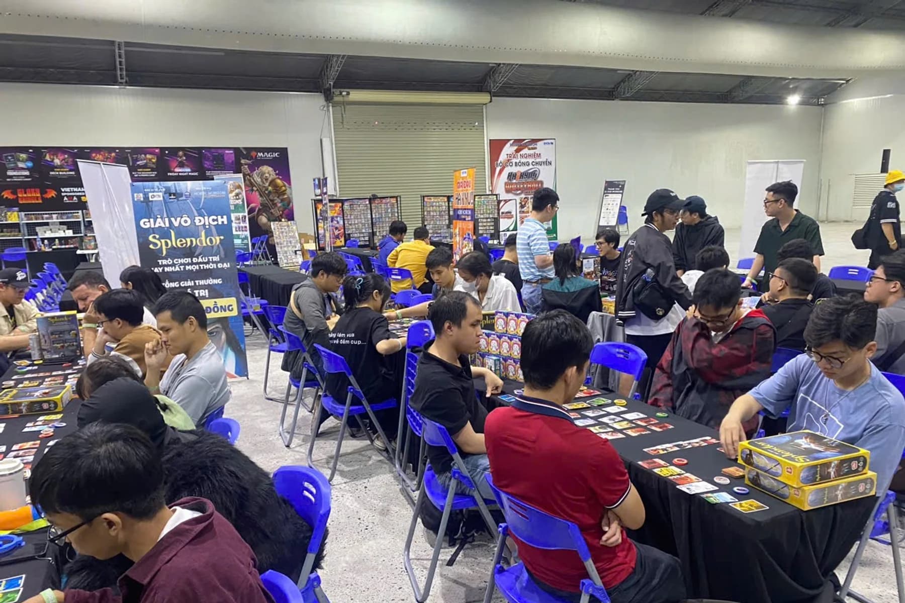 Road to Essen players testing games at long tables